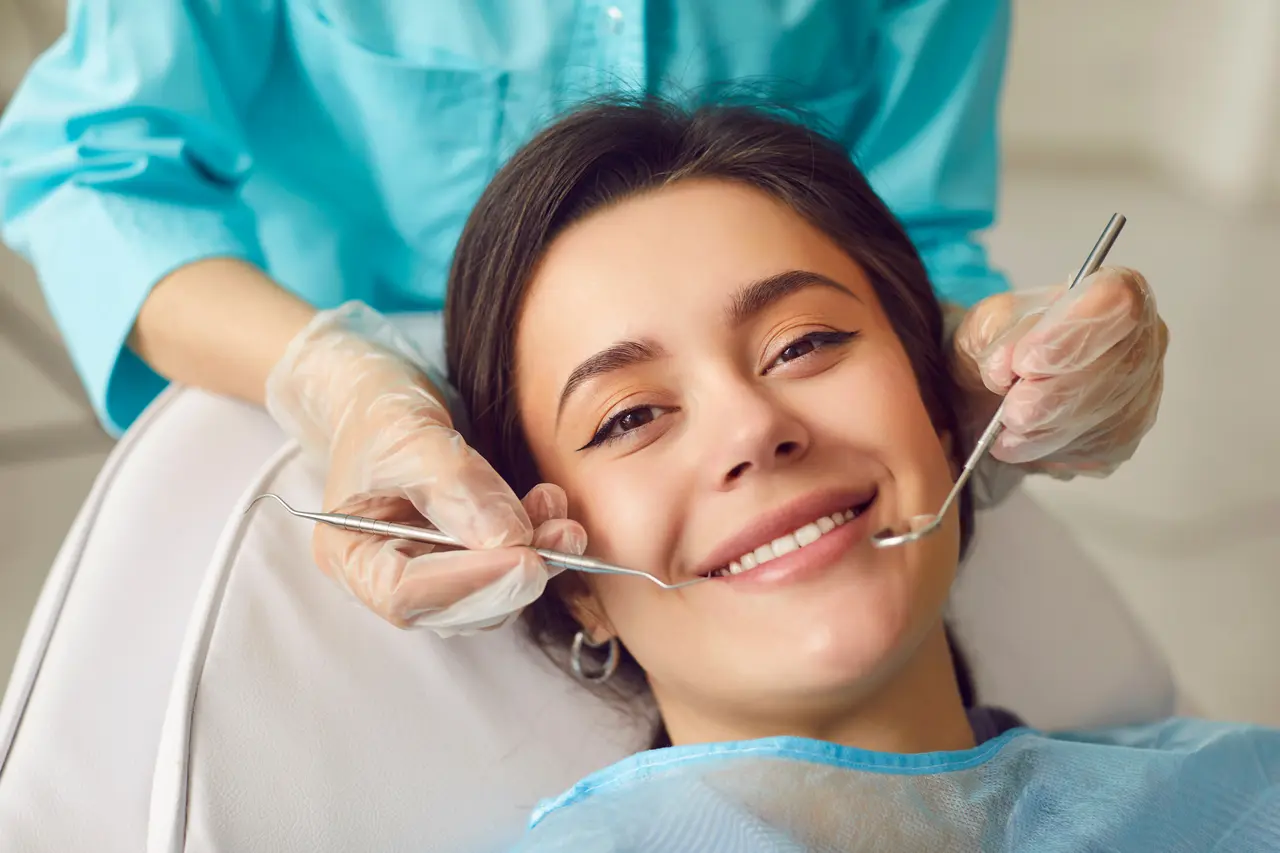 A relaxed, smiling patient during a visit at Molina Endodontics